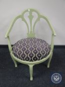 A painted elbow chair