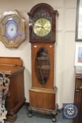 An early 20th century mahogany regulator clock, height 200 cm, with pendulum and two weights.