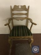 A blonde oak armchair