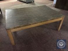 A large rectangular pine coffee table