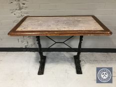 Two rectangular bar tables on cast iron bases