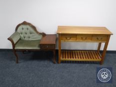 A reproduction three drawer side table and a telephone seat