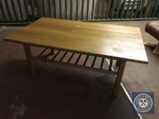 A refectory coffee table with two matching lamp tables