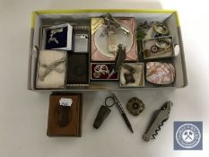 A box of assorted costume jewellery, brooches, Mauchline Bamburgh Castle box, wine bottle stopper,