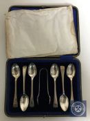 A set of six cased sterling silver teaspoons with sugar tongs