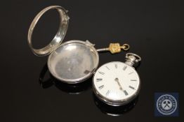 A silver Georgian pair cased pocket watch by Halliday, London No 15375. (Working).