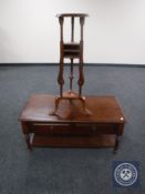 A contemporary storage coffee table fitted with two drawers together with a wig stand