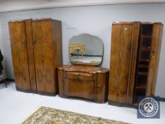 A three piece 20th century Shrager walnut bedroom suite