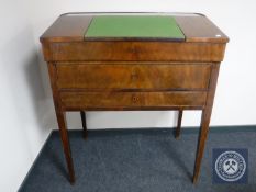 A 19th century continental mahogany clerk's desk CONDITION REPORT: Numerous