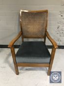 A 20th century bergere backed bedroom chair