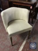 A mid 20th century elbow chair