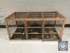 A triple section canary bird cage