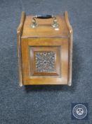 An Edwardian mahogany coal receiver with liner