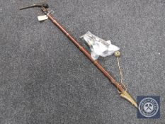 A long pipe with pipe bowls etc