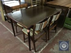 A late 20th century kitchen table and four chairs