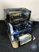 A tray of six boxed Maisto die cast vehicles