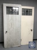 Two 20th century doors with stained glass panel