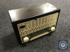 A Stella model number 1566 brown Bakelite cased radio.