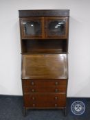 A mahogany bureau bookcase