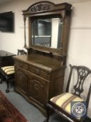 A late Victorian oak mirror backed sideboard,