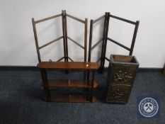 A set of mahogany wall shelves together with two folding towel rails and brass embossed stick stand