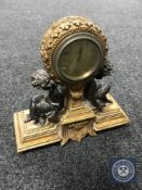 A continental gilt eight day mantel clock