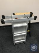 A folding workbench together with a folding multi-function ladder