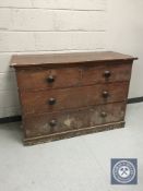 A Victorian pine four drawer chest
