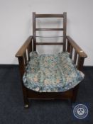 An early 20th century oak adjustable armchair