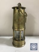 A brass Eccles Protector miner's lamp