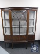 An Edwardian inlaid mahogany break-front display cabinet