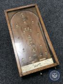 An early 20th century counter top 'The Migetelle' table bagatelle game