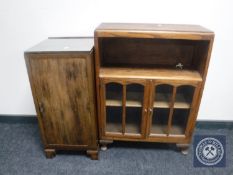 A walnut glass topped pot cupboard together with a small oak double door bookcase
