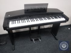 A Yamaha Clavinova CVP-20 electric keyboard on stand with stool CONDITION REPORT:
