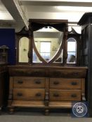 An Art Nouveau mahogany mirror backed sideboard, width 153 cm.
