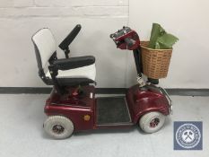 A Shop Rider mobility cart with charger and keys