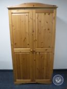 A pine double door wardrobe