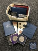 A tub containing a collection of crowns, decimal coin set, Australian Mint coin set,