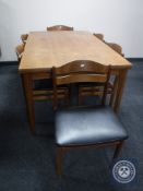 A mid twentieth century Danish teak extending table and six chairs
