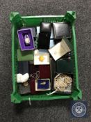 A basket containing assorted costume jewellery and simulated pearls