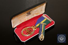 An Elizabeth II Territorial & Army Volunteer Reserve decoration in silver with miniature,