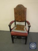 A Victorian oak and tooled leather upholstered armchair (a/f)