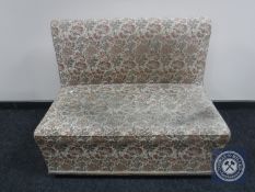 An early twentieth century floral upholstered storage bench