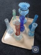 A tray of antique spiral twist glass bottles together with a part Victorian lustre