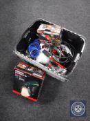 A plastic crate containing compressor tools and accessories