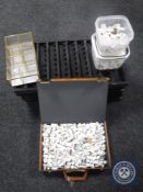 Seven wall mounted thimble racks together with a glass and brass miniature display cabinet and a