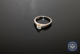 An 18ct gold solitaire diamond ring, approximately 0.