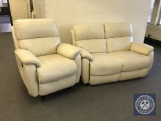 A cream leather two seater reclining settee and armchair
