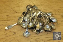 A collection of twenty-four Georgian and later silver salt and mustard spoons