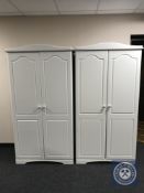 Two white double door wardrobes